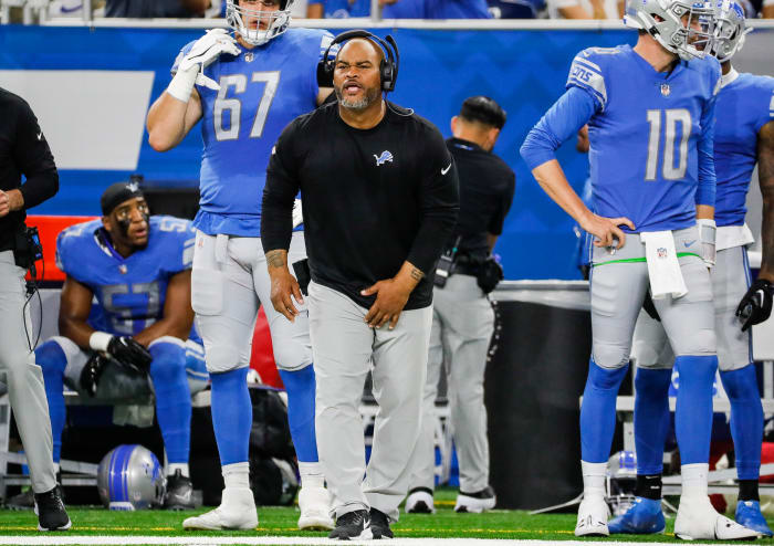 Duce Staley calls out from the sideline during a Lions game